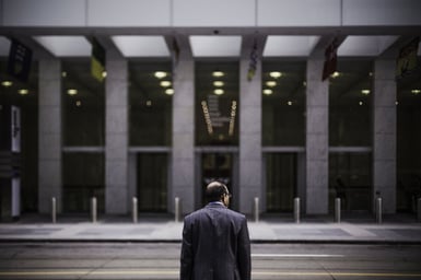 Businessman Pondering the Benefits of Delegating